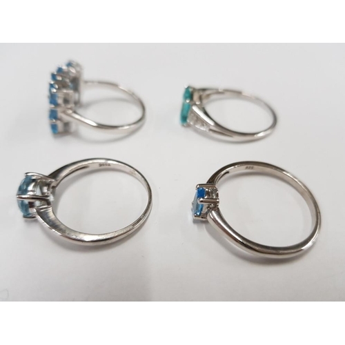 296 - FOUR SILVER BLUE AND GREEN STONE RINGS STAMPED SIZES R S AND T 1/2 12.4G GROSS