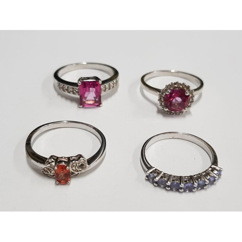 298 - FOUR SILVER PINK ORANGE AND PURPLE STONE RINGS STAMPED SIZES R 1/2 T 1/2 AND U 12.7G GROSS