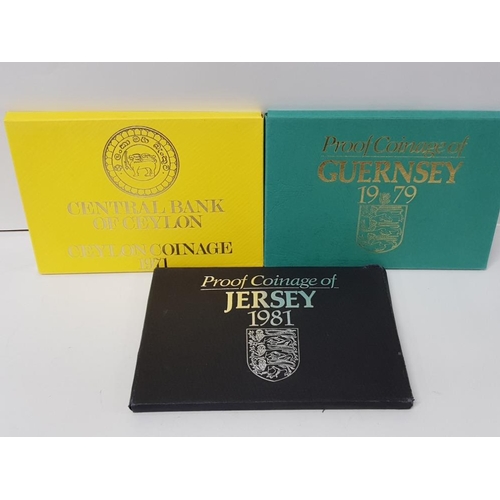 62 - 2 PROOF COIN SETS OF 1981 JERSEY AND 1979 GUERNSEY ALSO INCLUDES 1971 CENTRAL BANK OF CEYLON COINAGE... 