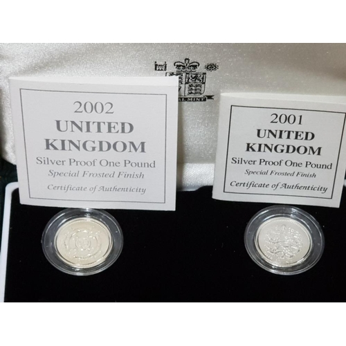 93 - ROYAL MINT 2001 AND 2002 1 POUND SILVER PROOF COINS BOTH WITH SPECIAL FROSTED FINISH AND HOUSED IN R... 