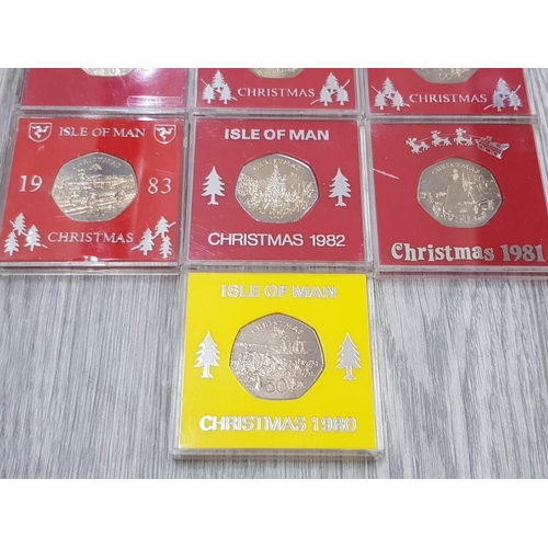 152 - ISLE OF MAN 50P CHRISTMAS COINS 1980 TO 1986 ALL DIFFERENT COINS IN EXCELLENT CONDITION HOUSED IN IN... 