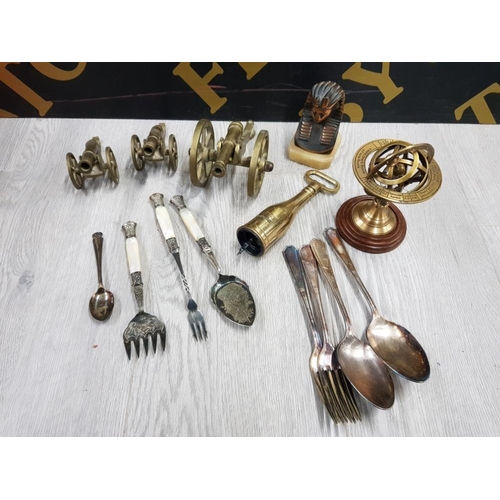 176 - COLLECTION OF BRASS ITEMS INCLUDES 3 CANNONS, REVOLVING STAR SIGN GLOBE, CHAMPAGNE CORKSCREW AND EPN... 