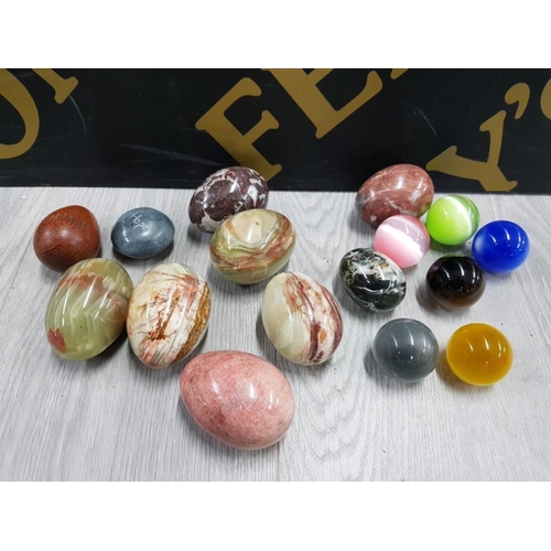 180 - MARBLE AND ONYX EGGS TOGETHER WITH GLASS BALLS POSSIBLY LARGE MARBLES