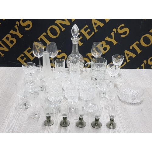 245 - A LARGE QUANTITY OF CRYSTAL INCLUDES DRINKING GLASSES BOHEMIAN DECANTER WITH STOPPER