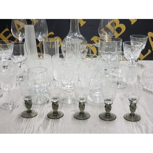 245 - A LARGE QUANTITY OF CRYSTAL INCLUDES DRINKING GLASSES BOHEMIAN DECANTER WITH STOPPER