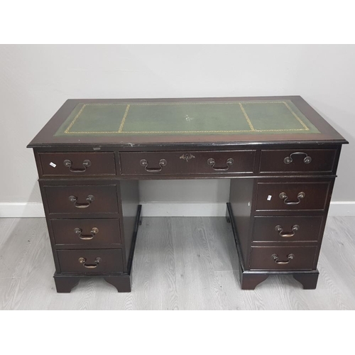 256 - A REPRODUCTION MAHOGANY LEATHER TOPPED DESK