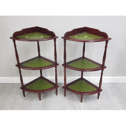 257 - A PAIR OF REPRODUCTION  MAHOGANY LEATHERED TOPPED WHAT NOT STANDS