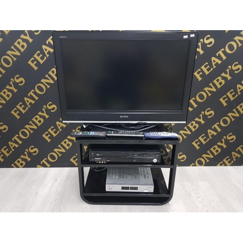 87 - SONY 32 INCH TV TOGETHER WITH PANASONIC DVD PLAYER VIRGIN BOX AND A TV STAND