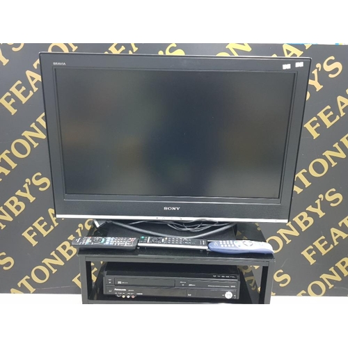 87 - SONY 32 INCH TV TOGETHER WITH PANASONIC DVD PLAYER VIRGIN BOX AND A TV STAND