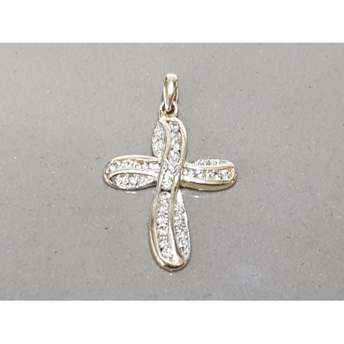 375 - 9CT YELLOW GOLD CUBIC ZIRCONIA SET CROSS SET WITH BRILLIANT ROUND CUBIC ZIRCONIA STONES SET IN A RUB... 