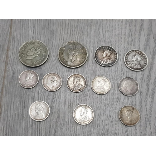 16 - SILVER EARLY INDIA COINS TO INCLUDE 2 1944 1/2 RUPEES 2 1/4 RUPEES AND 8 ZANNAS PRE 1918 INCLUDING V... 