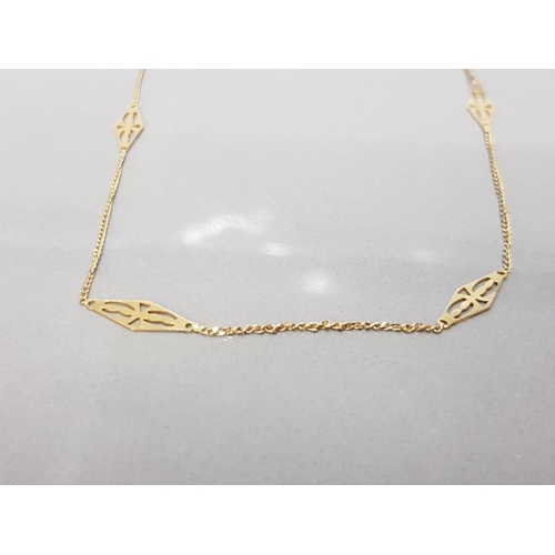 17 - 9CT YELLOW GOLD LADIES NECKLACE OF 6 INTER SPACED PIERCED DIAMOND SHAPED PANELS CONNECTED BY T LENGT... 
