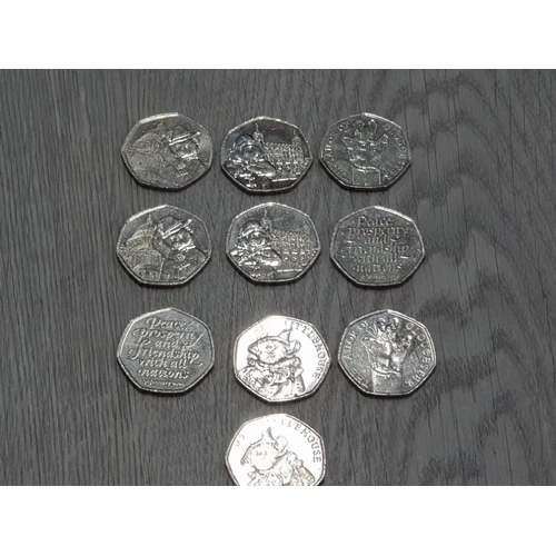 58 - COLLECTION OF 10 COLLECTABLE 50 PENCE PIECES