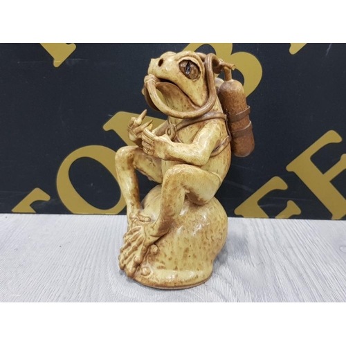 8 - JOHN TURRELL STUDIO POTTERY FIGURE OF A FROG SITTING ON A SMALL SHELL WEARING AQUALUNG A/F