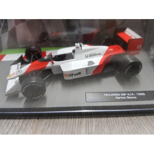 101 - 16 DIECAST FORMULA 1 CARS THE CAR COLLECTION ALL IN ORIGINAL BOXES WITH MAGAZINE