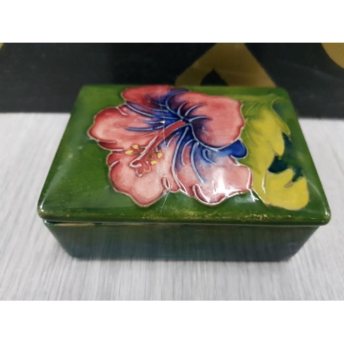 104 - MOORCROFT GREEN TRINKET BOX IN THE HIBISCUS PATTERN DAMAGE REPAIRED