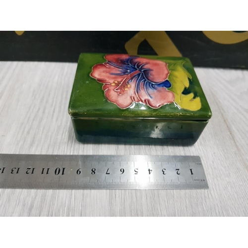 104 - MOORCROFT GREEN TRINKET BOX IN THE HIBISCUS PATTERN DAMAGE REPAIRED