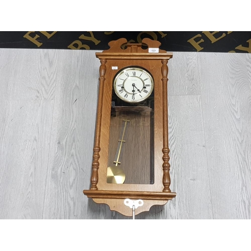 137 - WM WIDDOP PENDULUM WALL CLOCK WITH KEY