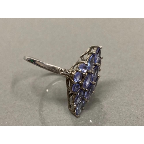 73 - SILVER TANZANITE 17 STONE CLUSTER RING WITH 4 DIAMOND SET SHOULDERS SIZE N 3.5G GROSS