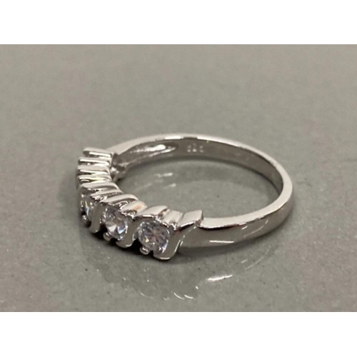 74 - SILVER AND CZ 5 STONE 1/2 ETERNITY RING SIZE O 2.7G GROSS