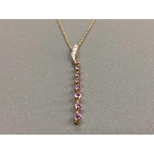 76 - 9CT YELLOW GOLD PENDANT SET EIGHT PINK SAPPHIRES AND 3 DIAMOND WITH 9CT YELLOW GOLD NECKLET 1.2G GRO... 