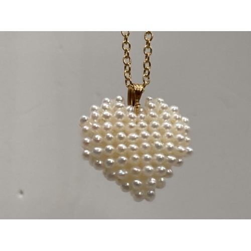 77 - ROLLED GOLD CHAIN WITH PEARL SET HEART SHAPED PENDANT