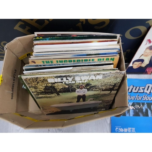 57 - COLLECTION OF VINYL RECORDS INCLUDES COMPLETE MADNESS, STATUS QUO BLUE FOR YOU, STATUS QUO THE ANNIV... 