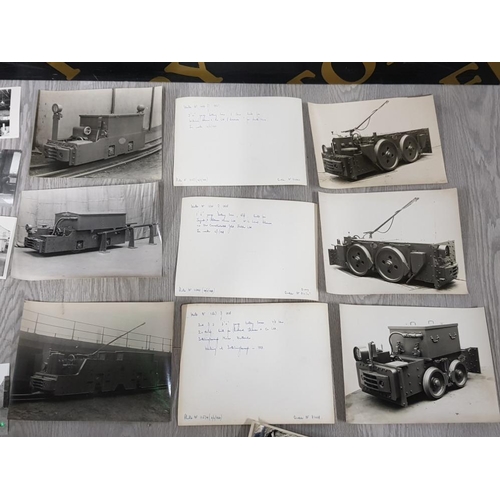 110 - LARGE COLLECTION OF BLACK AND WHITE PHOTOGRAPHS OF RAILWAY TRAINS WITH HAND WRITTEN DESCRIPTIONS ON ... 