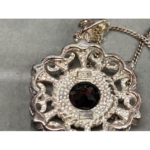 228 - SILVER AND ROUND GARNET PENDANT ON SILVER CHAIN 6.1G GROSS