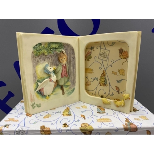 275 - TWO BEATRIX POTTER BOXED ITEMS INCLUDING JEMIMA PUDDLE-DUCK BOOK PICTURE FRAME & MRS. TIGGY-WINK... 