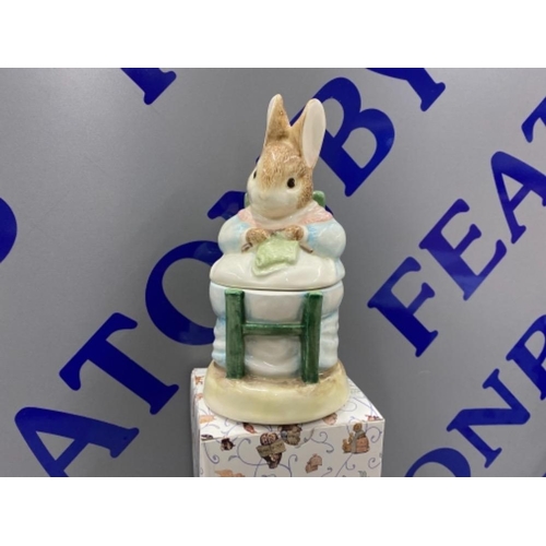 283 - TWO BEATRIX POTTER BOXED ITEMS INCLUDING MRS. RABBIT CANISTER & MRS. RABBIT WITH BABIES