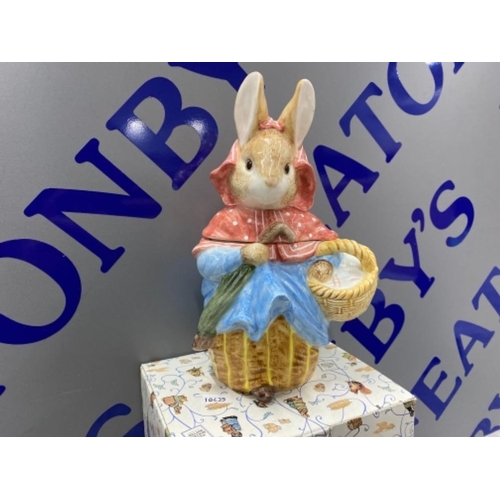 283 - TWO BEATRIX POTTER BOXED ITEMS INCLUDING MRS. RABBIT CANISTER & MRS. RABBIT WITH BABIES