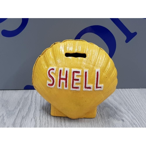 296 - CAST METAL SHELL OIL MONEY BOX