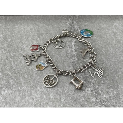 398 - SILVER ASSORTED CHARM BRACELET 29.8G