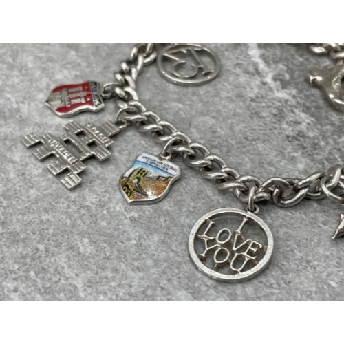 398 - SILVER ASSORTED CHARM BRACELET 29.8G