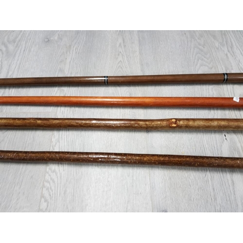 72 - 4 WALKING STICKS ONE WITH DUCKS HEAD HANDLE WHICH SCREWS OFF TO REVEAL PLASTIC SPIRIT FLASK, OTHERS ... 