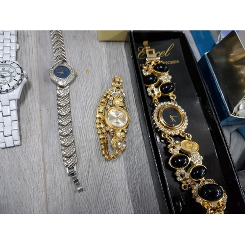 97 - 8 FASHIONABLE WRIST WATCHES WITH A COLLECTION OF COSTUME JEWELLERY INCLUDES EARINGS AND NECKLACES ET... 