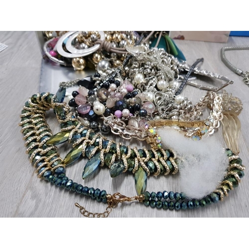 98 - COLLECTION OF COSTUME JEWELLERY INCLUDING NECKLACES,  EARRINGS AND BRACELETS ETC