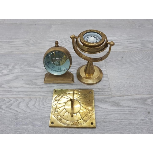 13 - 3 BRASS ITEMS INCLUDES A SWIVEL COMPASS CLOCK AND A SUNDIAL