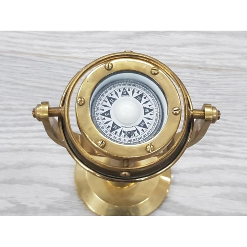 13 - 3 BRASS ITEMS INCLUDES A SWIVEL COMPASS CLOCK AND A SUNDIAL