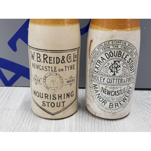 379 - 2 STONEWARE BOTTLES INCLUDES W.B. REID AND CO LD NEWCASTLE ON TYNE  NOURISHING STOUT AND EXTRA DOUBL... 