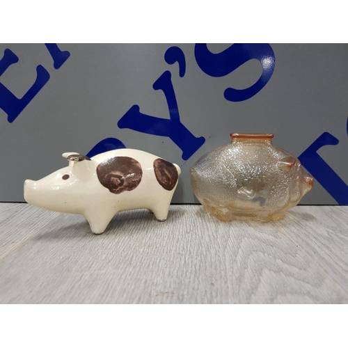 41 - 2 MONEY BOXES INCLUDING SPOTTED POTTERY STUDIO PIGGY BANK BY HERMAN KAHLER AND SIGNED HEGNET SLUND T... 