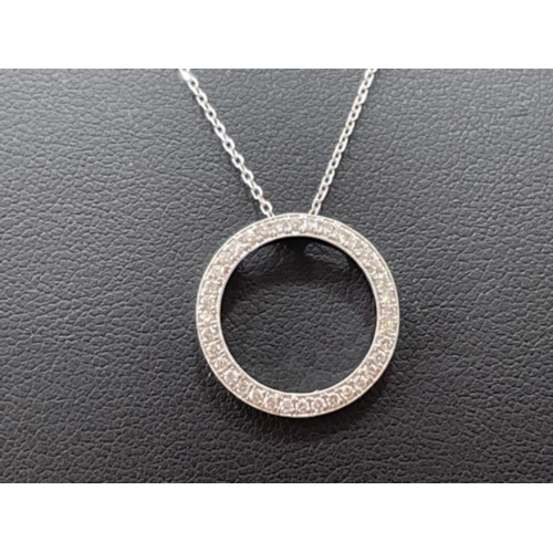 121 - 18CT WHITE GOLD HALO STYLE PENDANT NECKLACE 1/2CTS