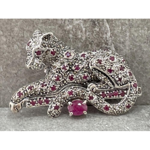 125 - SILVER PANTHER BROOCH SET WITH RUBIES