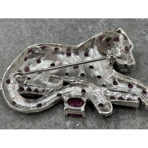 125 - SILVER PANTHER BROOCH SET WITH RUBIES