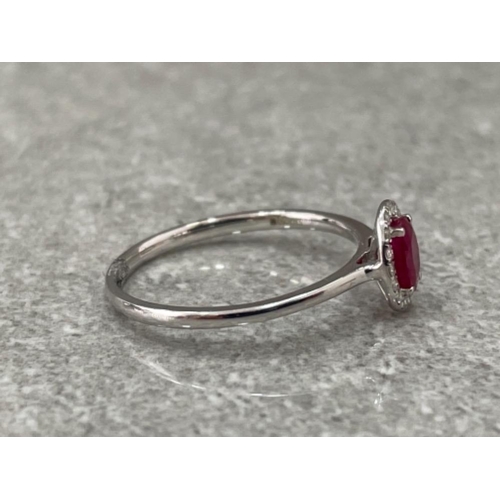 58 - 18CT WHITE GOLD RUBY AND DIAMOND RING .60CTS SIZE O 1.7G