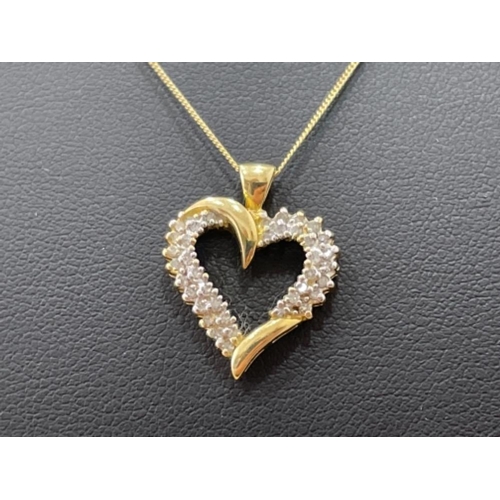 60 - 9CT GOLD DIAMOND SET HEART SHAPED PENDANT NECKLACE