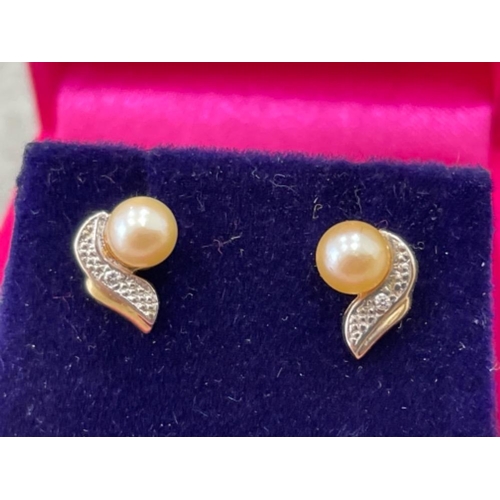 61 - PAIR OF GOLD PEARL AND DIAMOND SET EARRINGS