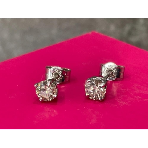 65 - PAIR OF 14CT WHITE GOLD DIAMOND STUDS 60 POINTS