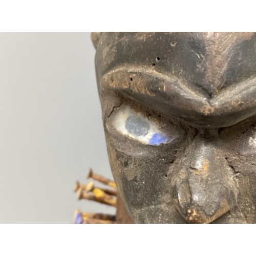 77 - AFRICAN 19TH/20TH CENTURY NKISI VILL NKONDI FETTISH STATUE HUNCHBACKED FIGURE NAILS GLASS EYES AND S... 